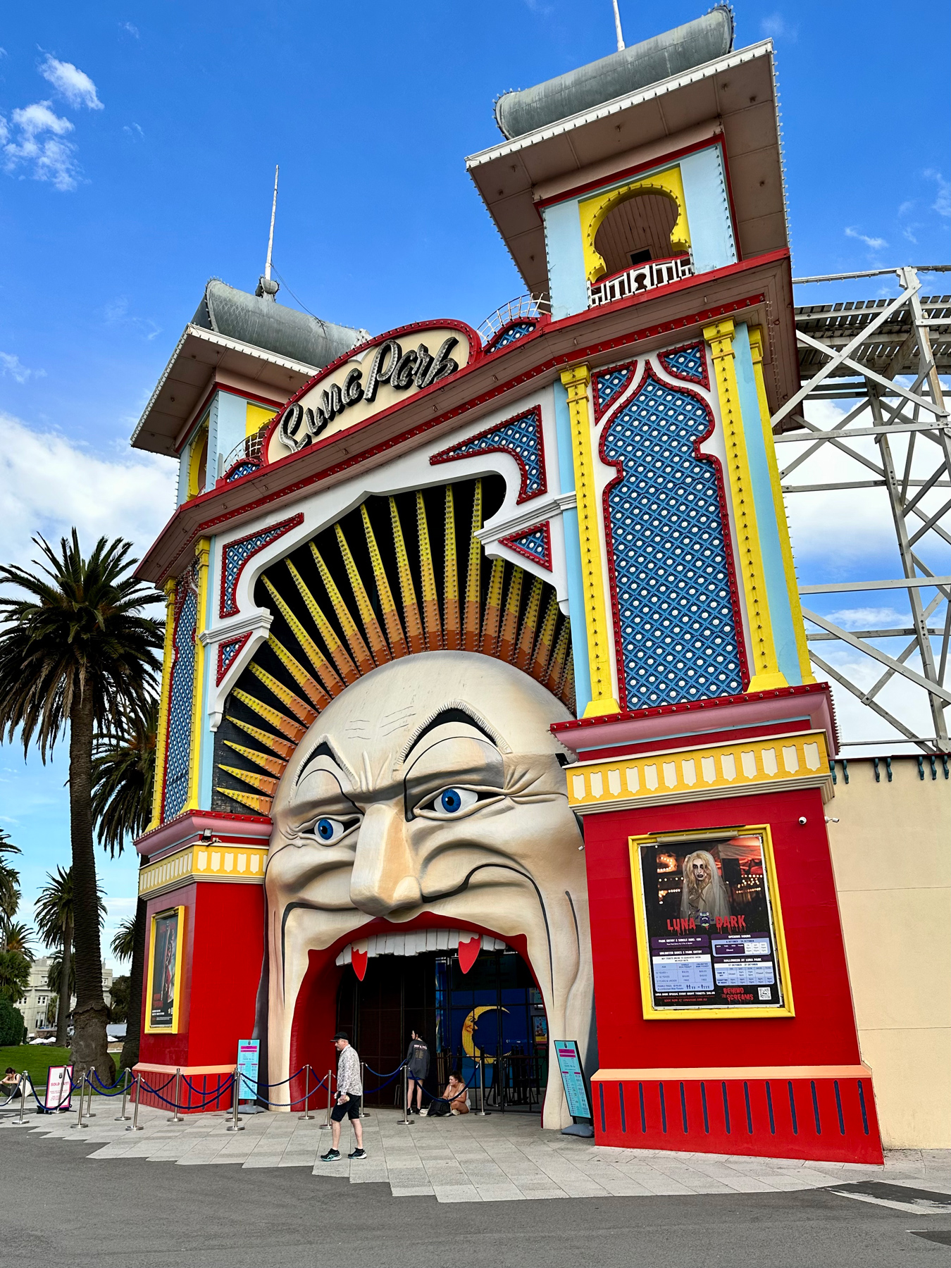 The entrance to Luna Park which is a large creepy-looking face, you walk through the open mouth to enter