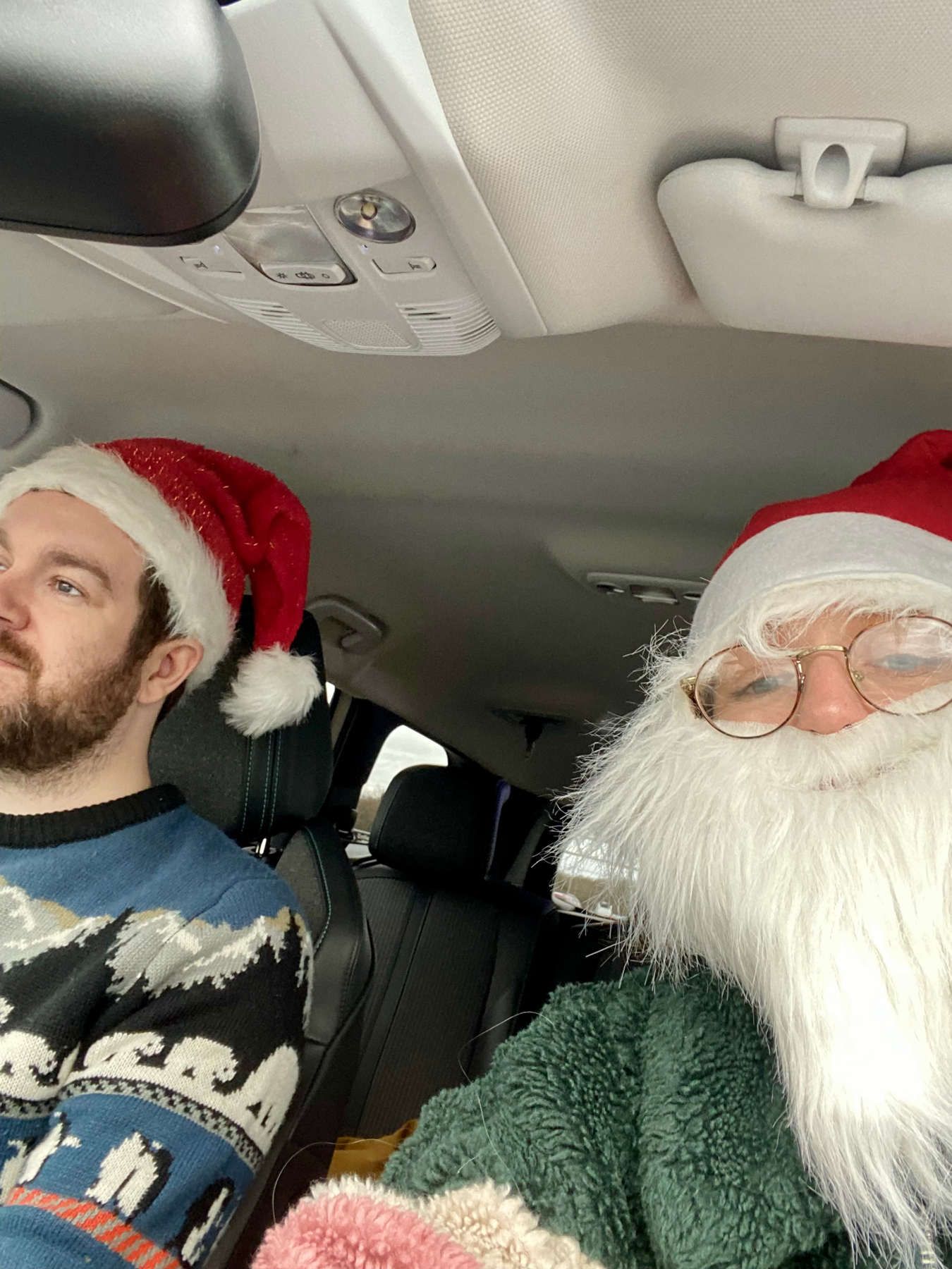 Me and Charlotte in the car dressed in Santa hats