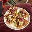 Heart-shaped tostadas loaded with different toppings