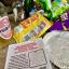 An array of different crisps and a flyer for the Huddersfield International Crisp Festival 2025