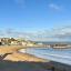 A view from the sea front at Broadstairs, looking down over a cold but sunny beach