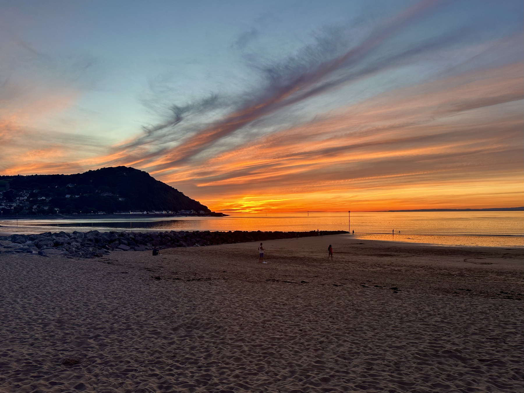 A beautiful sunset over the beach in Minehead