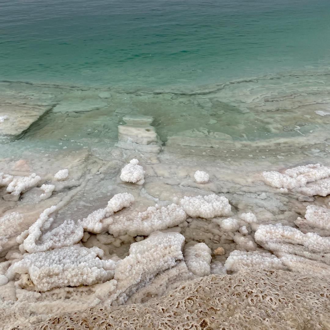 Salt crystals visible beneath the surface of the Dead Sea