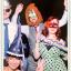 Me, Charlotte, Jenn, and Chris in a photo booth. I'm wearing a poop-shaped hat and beer glasses, Chris is wearing a tiara, Jenn is wearing a mask, and Charlotte has a shark hat on